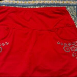 Women’s Athleta red skorts w/grey reflective accents, med, back zipper, like new